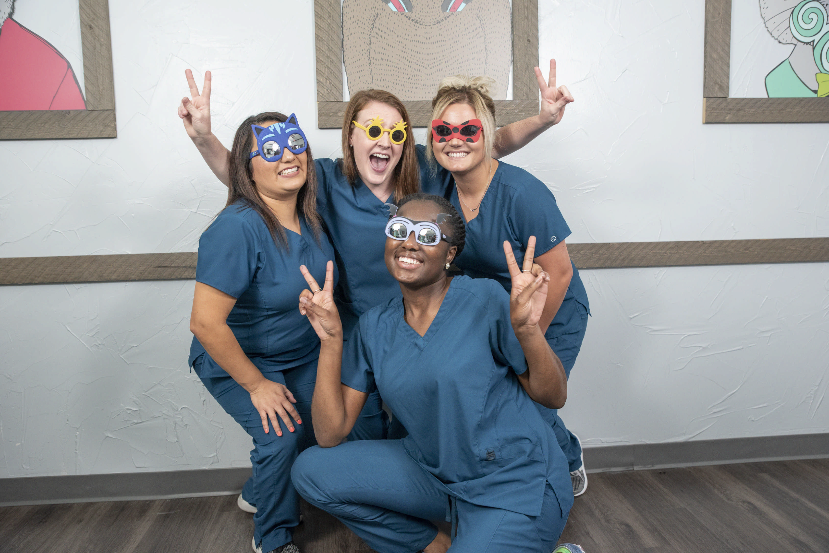 Dental team with funny props